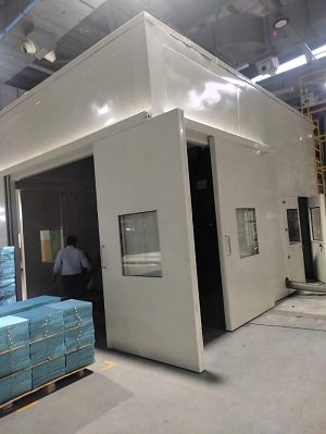 Acoustic Enclosure For Fin Press With Pneumatic Sliding Door