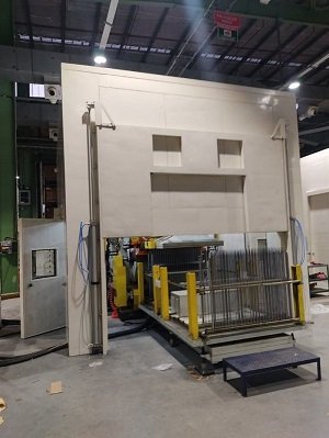 Acoustic Enclosure For Fin Press With Pneumatic Sliding Door